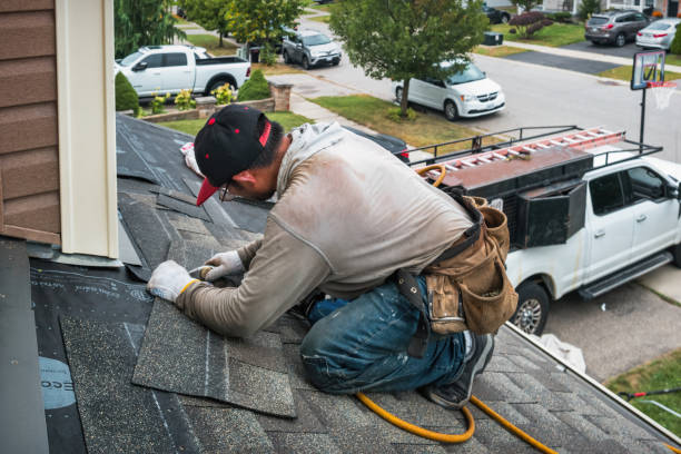 Professional Roofing technician working in Amherst, WI